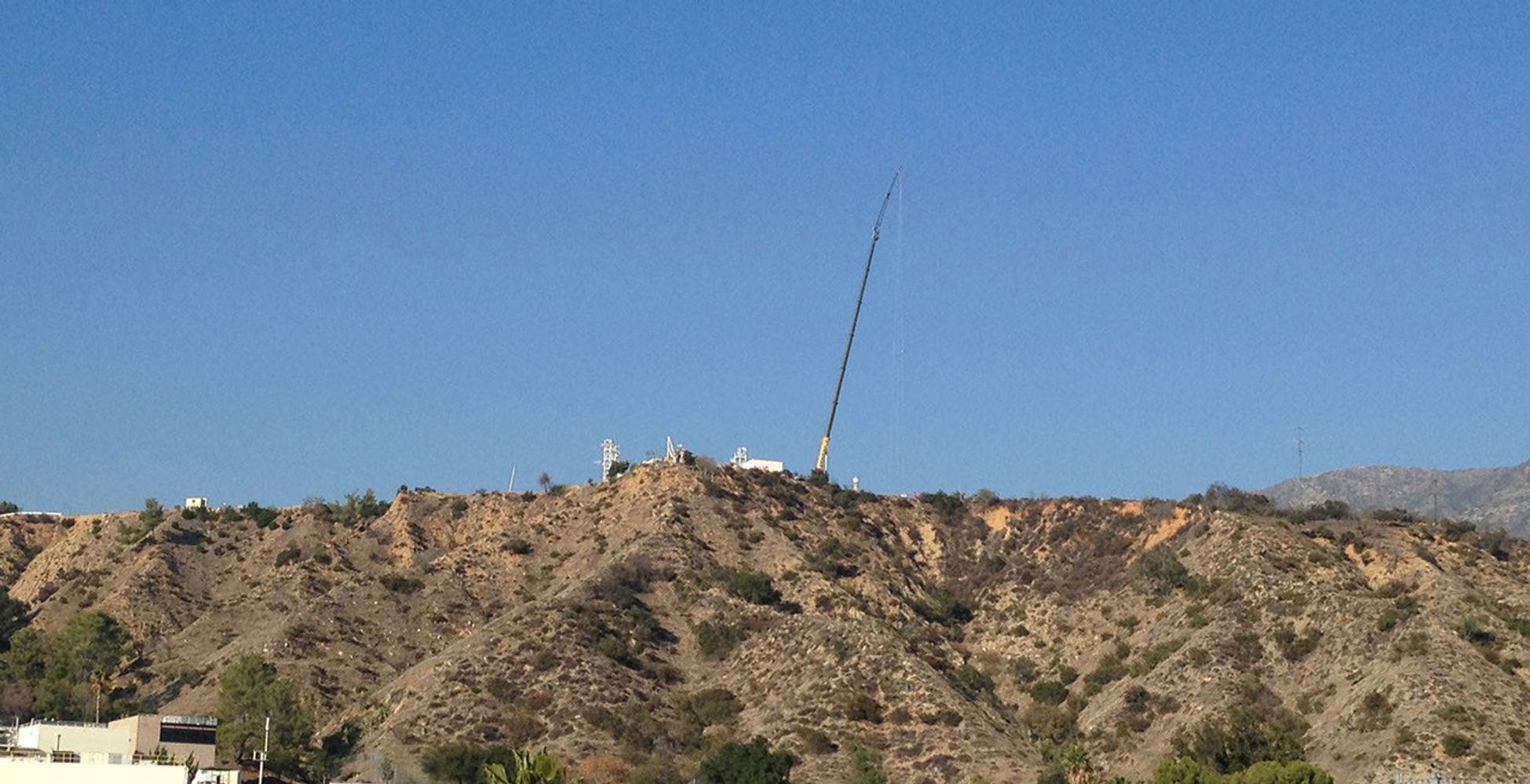 A 100-foot diameter packed-parachute, bridles and lines are readied into position for a Low Density Supersonic Decelerator (LDSD) test that occurred at the U.S. Naval Air Weapons Station at China Lake earlier this year.