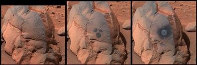 This image shows the rock dubbed "Humphrey" and the circular areas on the rock that were wiped off by the rover.