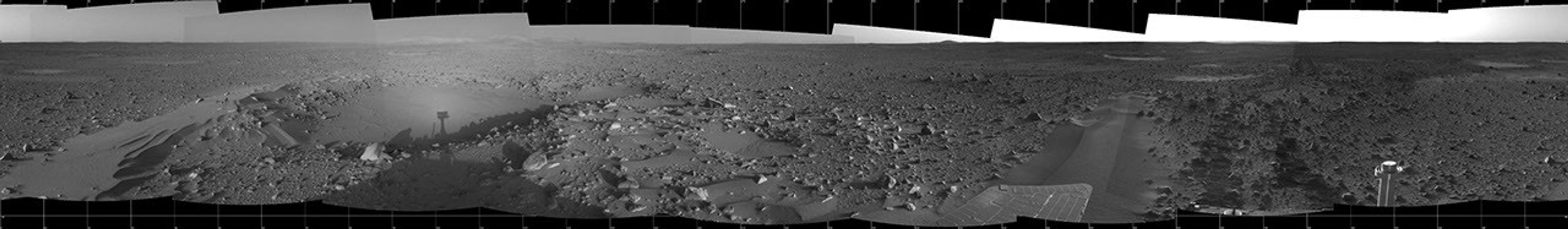 This image highlights the bumpy terrain surrounding the rover.