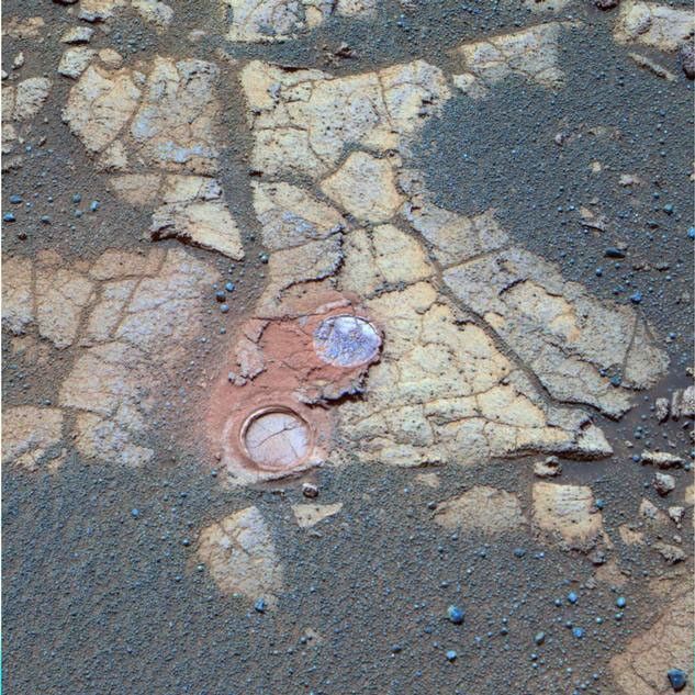 This false-color panoramic image, taken on martian day, or sol, 561 (Aug. 22, 2005) by the Opportunity rover, shows the nature of the outcrop rocks that the rover is encountering on its southward journey across the martian plains to "Erebus Crater."