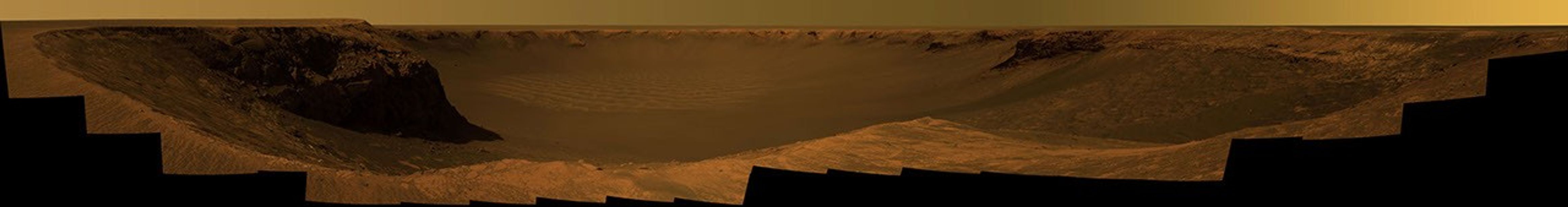 Opportunity captured this vista of "Victoria Crater" from the viewpoint of "Cape Verde," one of the promontories that are part of the scalloped rim of the crater.