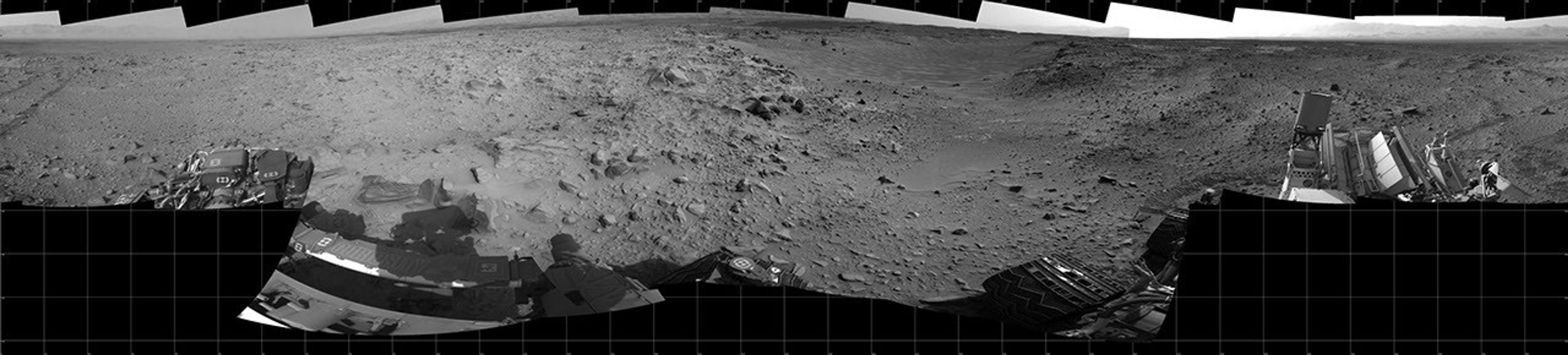 This panorama of the landscape surrounding NASA's Curiosity Mars rover on July 31, 2014, offers a view into sandy lower terrain called "Hidden Valley," which is on the planned route ahead.