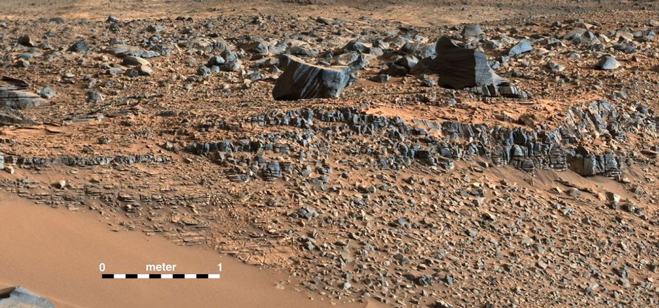This portion of a color mosaic taken by NASA's Mars Curiosity rover shows strata exposed along the margins of the valleys in the "Pahrump Hills" region on Mars.