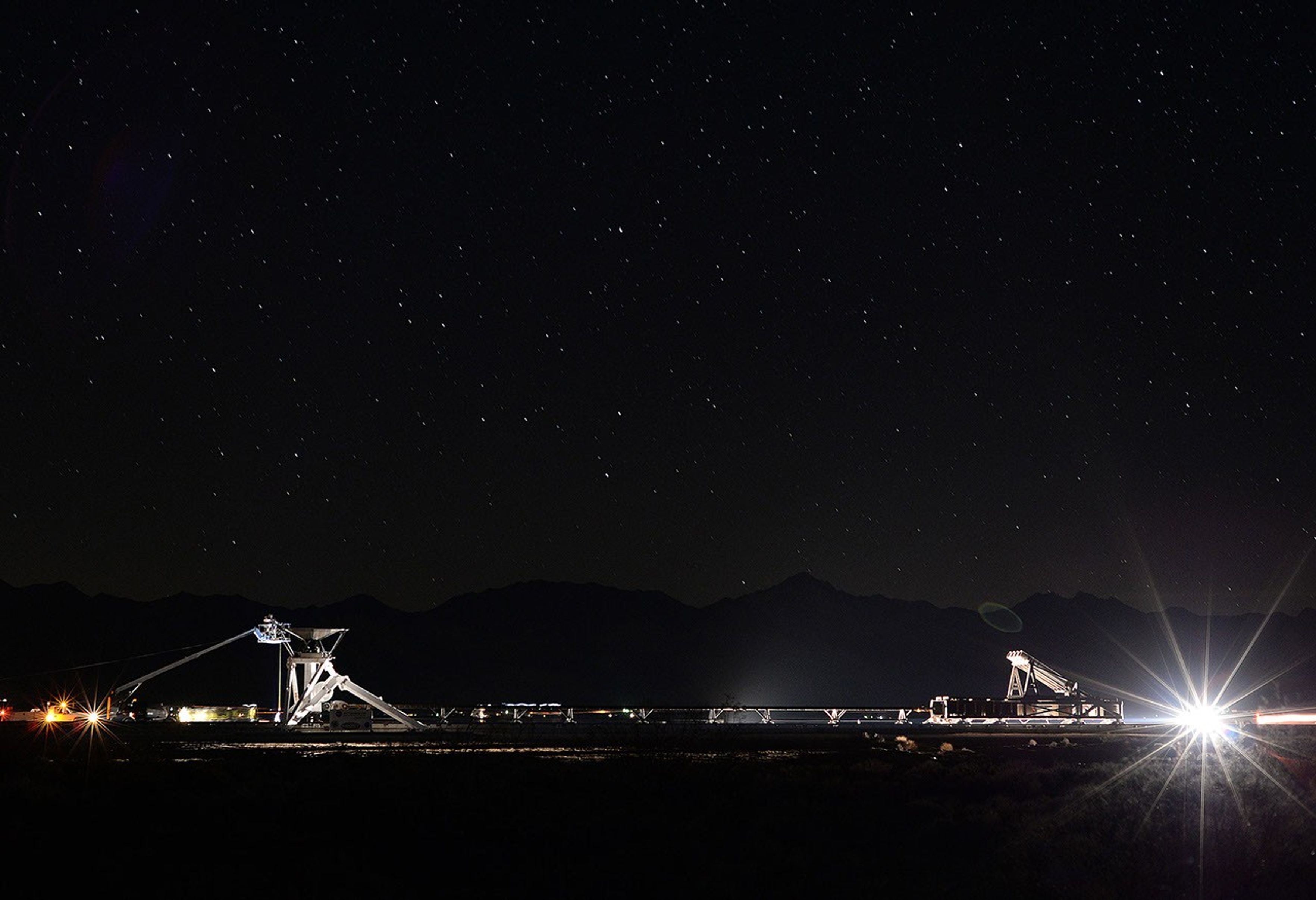 The tools of the rocket sled trade can be seen in this nighttime shot from the Supersonic Naval Ordnance Research Track (SNORT) at the Naval Air Weapons Station China Lake in California.