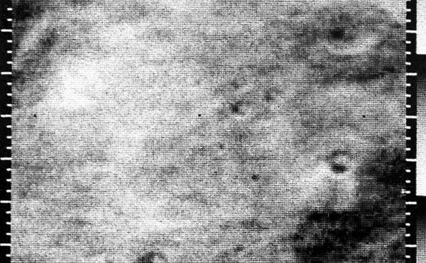 This Mariner 4 image shows some craters in southern Amazonis Planitia.