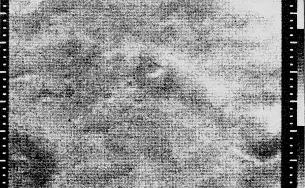 Mariner 4 image showing a relatively featureless area south of Sirenum Fossae on Mars.