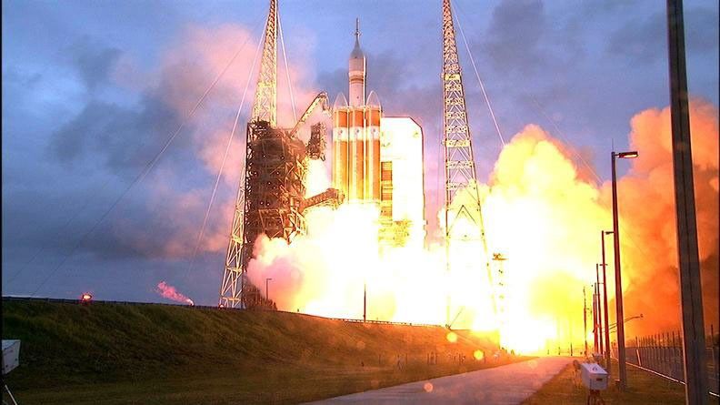 A Delta IV Heavy rocket lifts off from Space Launch Complex 37 at Cape Canaveral Air Force Station in Florida carrying NASA's Orion spacecraft on an unpiloted flight test to Earth orbit. Liftoff was at 7:05 a.m. EST.
