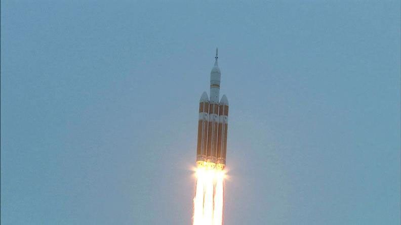 A Delta IV Heavy rocket lifts off from Space Launch Complex 37 at Cape Canaveral Air Force Station in Florida carrying NASA's Orion spacecraft on an unpiloted flight test to Earth orbit. Liftoff was at 7:05 a.m. EST.