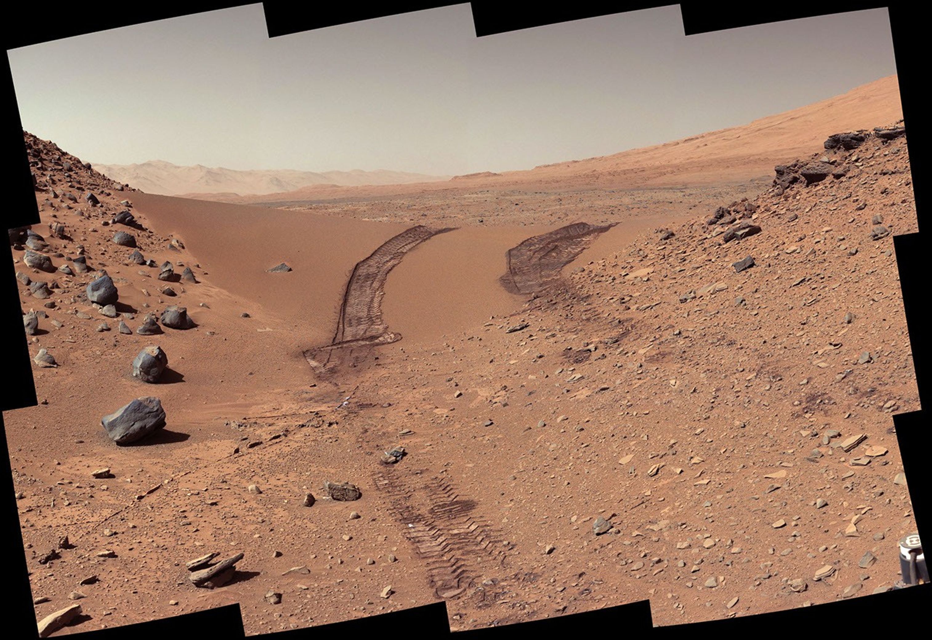 This look back at a dune that NASA's Curiosity Mars rover drove across was taken by the rover's Mast Camera (Mastcam) during the 538th Martian day, or sol, of Curiosity's work on Mars (Feb. 9, 2014).
