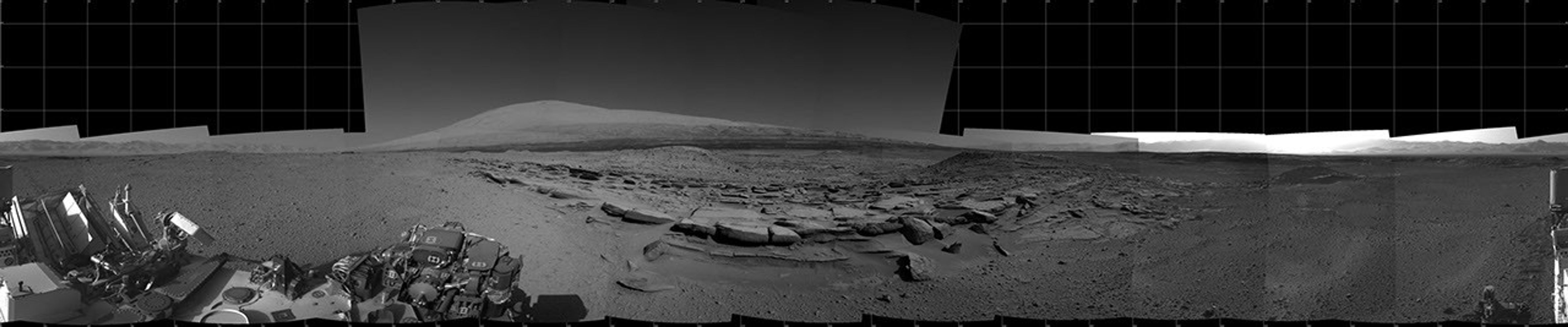 This view from NASA's Curiosity Mars rover spans 360 degrees, centered southward toward a planned science waypoint at "the Kimberley," with an outcrop of eroded sandstone in the foreground. It combines several frames taken by the Navigation Camera on March 18, 2014.