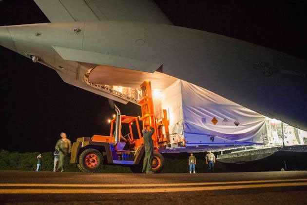Engineers unload ground support equipment for a June engineering test flight above Kauai, Hawaii.