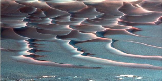 As NASA's Mars Exploration Rover Opportunity creeps farther into "Endurance Crater," the dune field on the crater floor appears even more dramatic