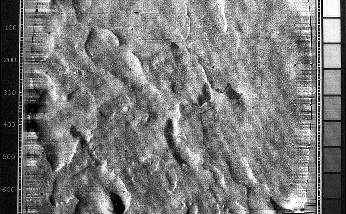 High-resolution Mariner 9 image showing an area of irregular pits and depressions near the south pole of Mars