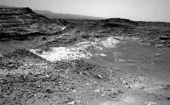 The Martian outcrop where pale rock meets darker overlying rock near the middle of this May 21, 2015, view is an example of a geological contact. Such contacts can reveal clues about how environmental conditions that produced one type of rock were related to conditions that produced the other.