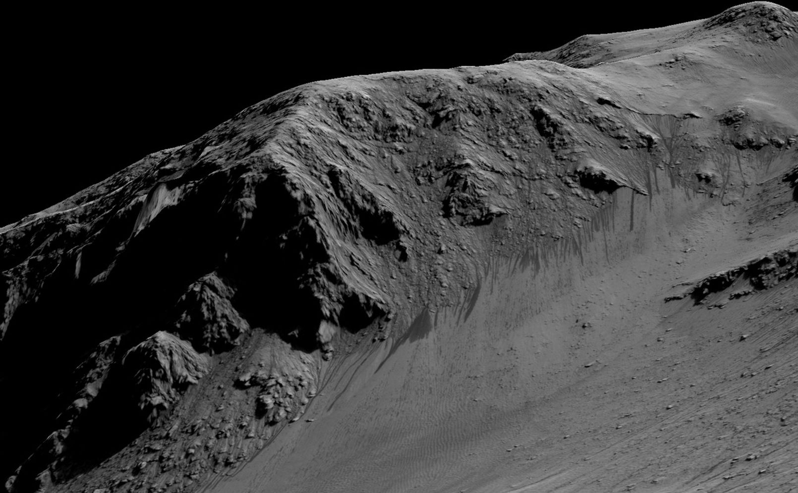 Dark, narrow streaks on Martian slopes such as these at Horowitz Crater are inferred to have been formed by seasonal flow of water on contemporary Mars. Detection of hydrated salts at the streaks supports that interpretation. The features are called "recurring slope lineae."