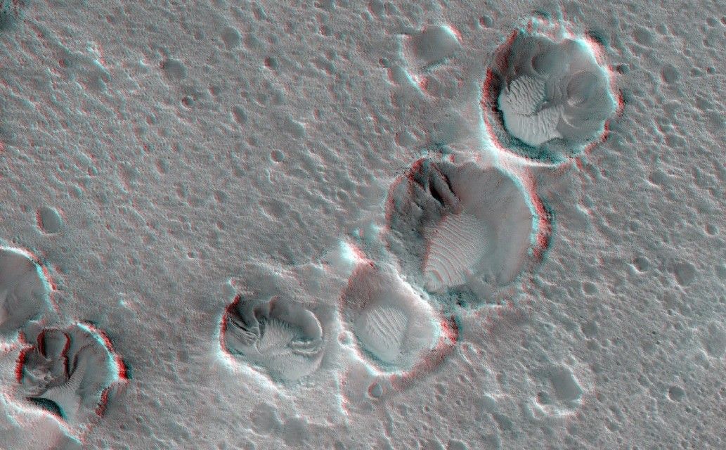 This May 2015 image from the HiRISE camera on NASA's Mars Reconnaissance Orbiter shows a location on Mars associated with the best-selling novel and Hollywood movie, "The Martian." It is in a region called Acidalia Planitia, at the landing site for the science-fiction tale's Ares 3 mission.