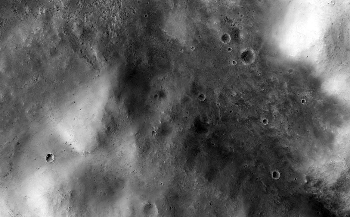 In the novel and movie "The Martian," an astronaut's adventures take him to the rim of Mawrth Crater. This image from the HiRISE camera on NASA's Mars Reconnaissance Orbiter shows the nature of this terrain.