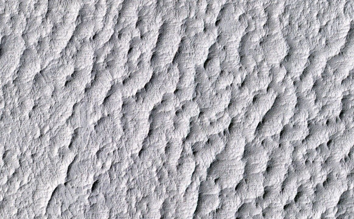 This image from the HiRISE camera on NASA's Mars Reconnaissance Orbiter shows a location associated with the novel and movie, "The Martian." It is the tale's planned landing site for the Ares 4 mission.
