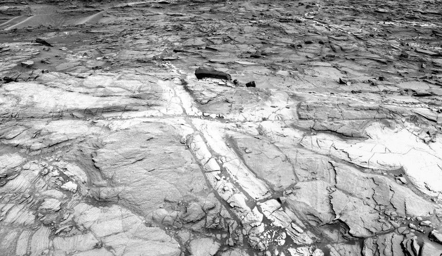 This view from NASA's Curiosity Mars rover shows an example of discoloration closely linked to fractures in the Stimson formation sandstone on lower Mount Sharp.