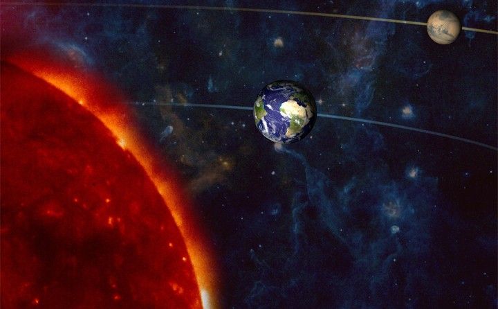 Artist's concept of Mars Opposition on December 24, 2007. The distances between the sun, the planets, and the distant nebula are not to scale.