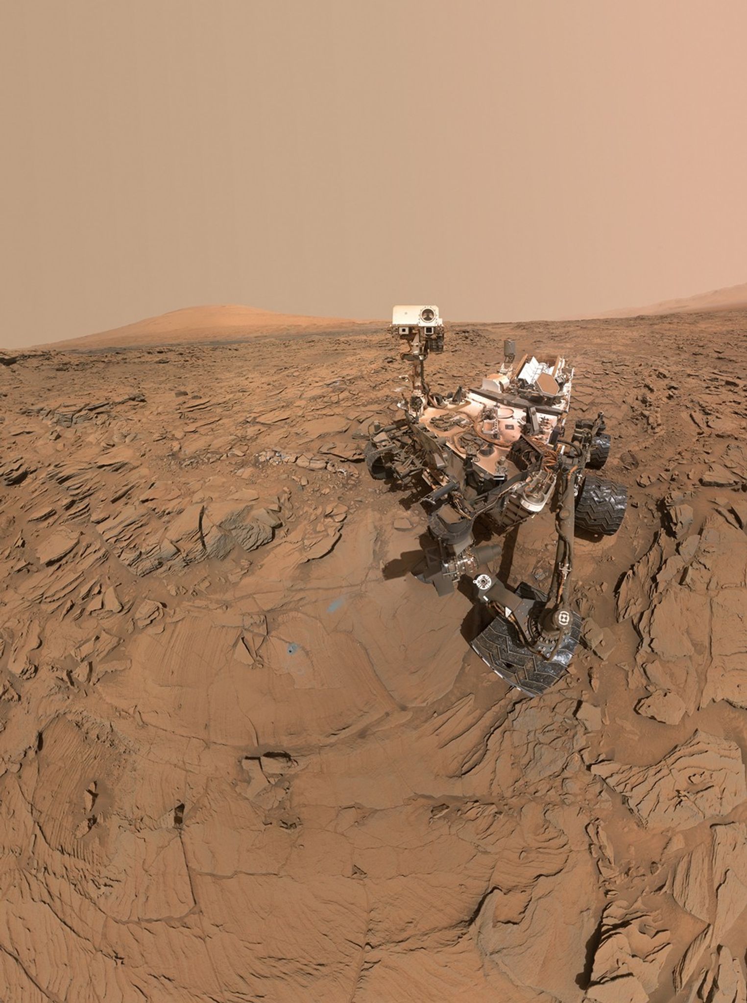 This May 11, 2016, self-portrait of NASA's Curiosity Mars rover shows the vehicle at the "Okoruso" drilling site on lower Mount Sharp's "Naukluft Plateau."  The scene is a mosaic of multiple images taken with the arm-mounted Mars Hands Lens Imager (MAHLI).