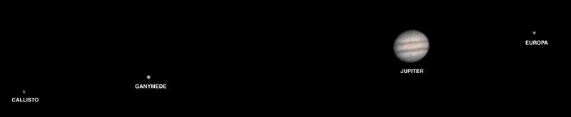 This image, taken by the Mars Orbiter Camera on the Mars Global Surveyor (MGS) spacecraft shows Jupiter and three of the four Galilean satellites.