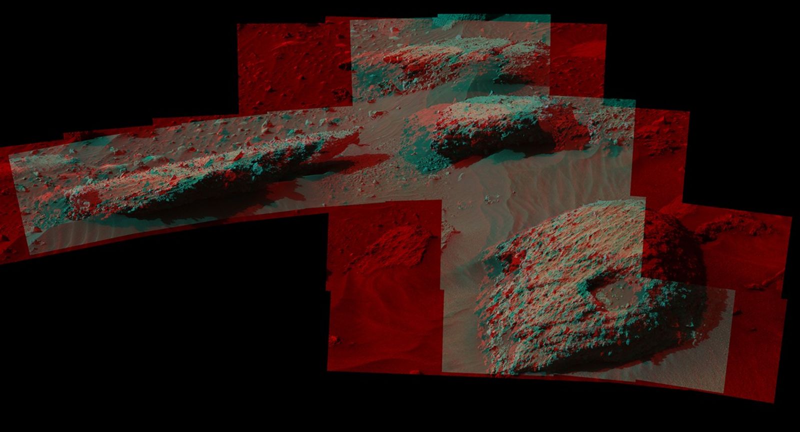 This July 22, 2016, stereo scene from the Mastcam on NASA's Curiosity Mars Rover shows boulders at a site called "Bimbe" on lower Mount Sharp. They contain pebble-size and larger rock fragments. The image appears three dimensional when viewed through red-blue glasses with the red lens on the left.