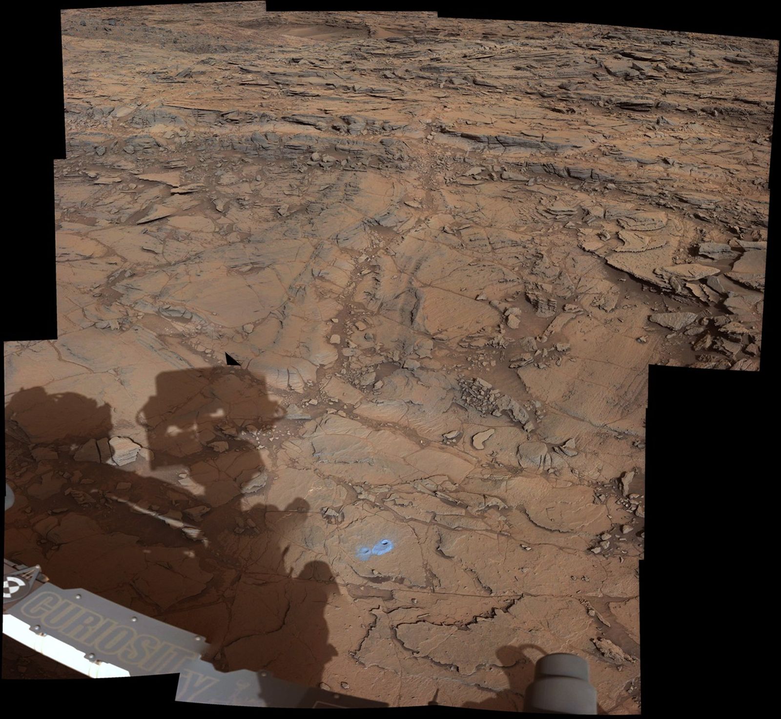 This view from the Mast Camera (Mastcam) on NASA's Curiosity Mars rover covers an area in "Bridger Basin" that includes the locations where the rover drilled a target called "Big Sky" on the mission's Sol 1119 (Sept. 29, 2015) and a target called "Greenhorn" on Sol 1137 (Oct. 18, 2015).