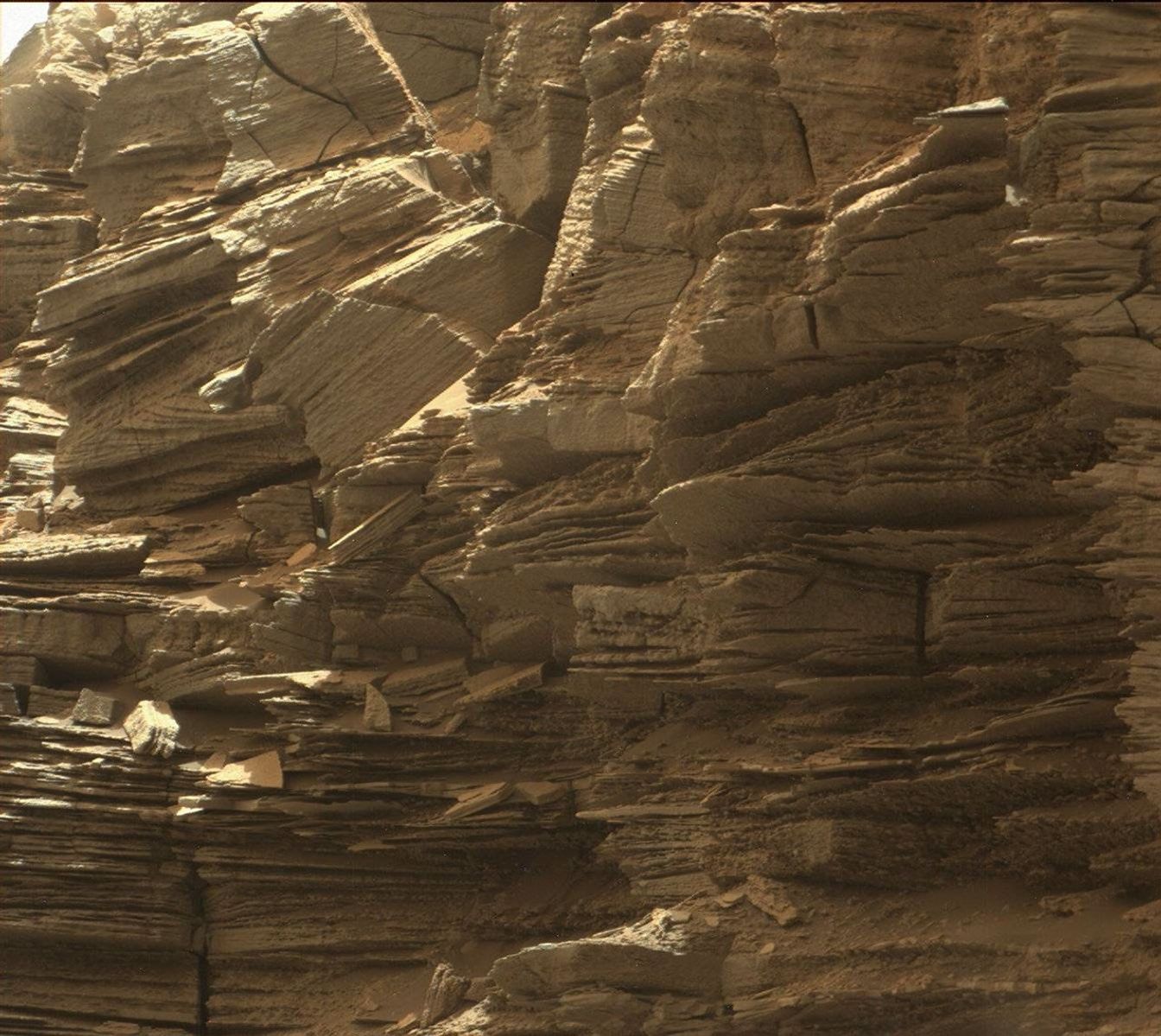 This closeup view from NASA's Curiosity rover shows finely layered rocks, deposited by wind long ago as migrating sand dunes.