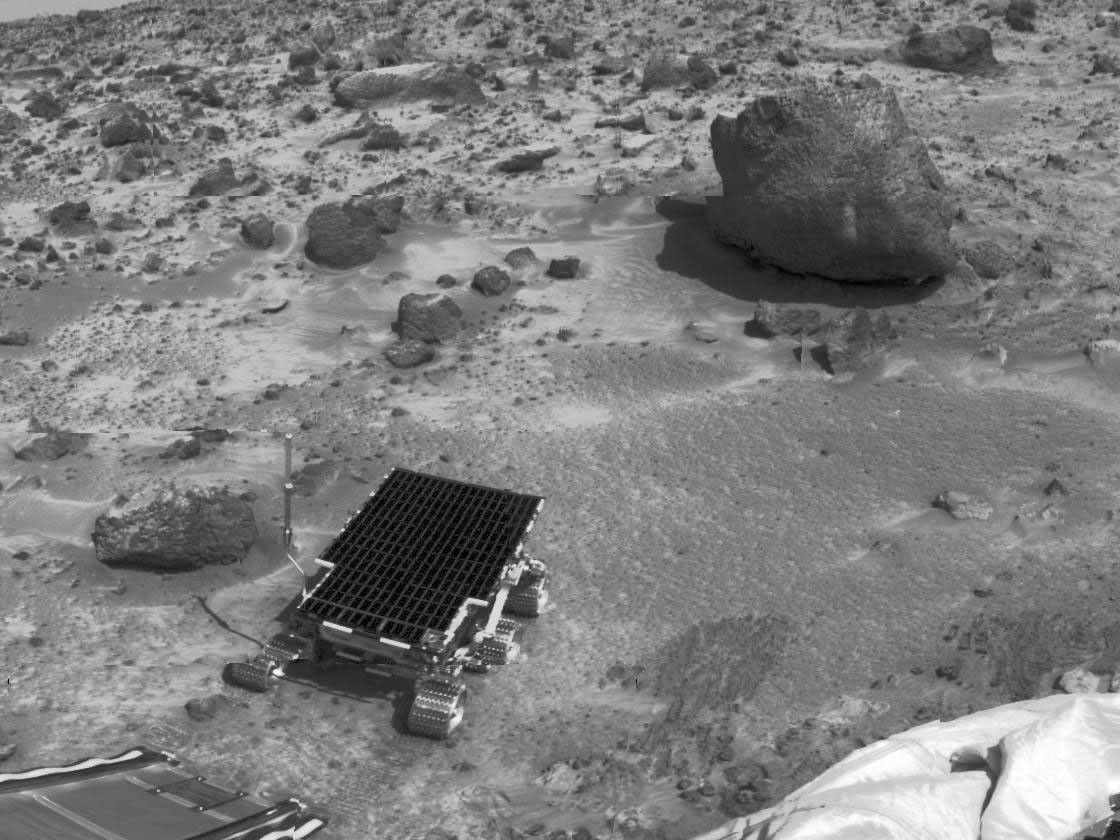 Barnacle Bill,' the small rock at left, and 'Yogi,' the large rock at upper right, are shown as viewed by NASA's Imager for Mars Pathfinder (IMP) on July 7, 1997.