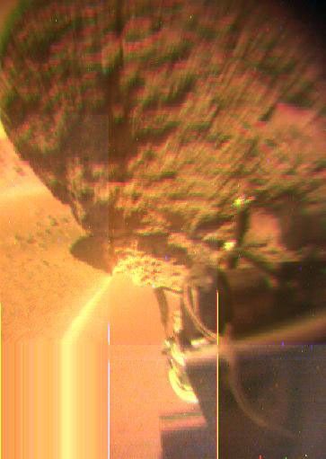 This image shows a close-up view of the large rock nicknamed 'Yogi ' from NASA's Sojourner rover's rear color camera.