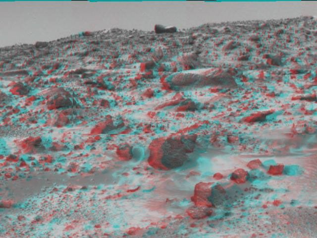 This area of terrain near the Sagan Memorial Station was taken by NASA's Mars Pathfinder. The curved rock dubbed 'Couch.' 3D glasses are necessary to identify surface detail.