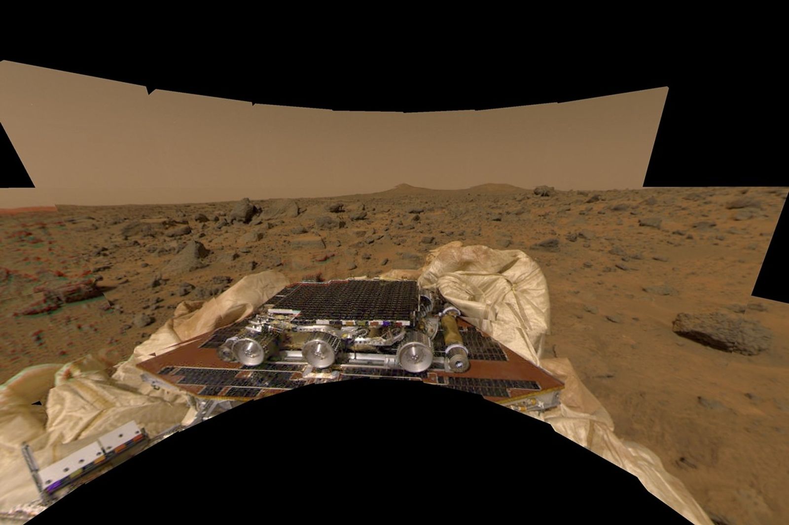This image features a different perspective of one of the first pictures taken by the Imager for Mars Pathfinder (IMP) lander shortly after its touchdown at 10:07 AM Pacific Daylight Time on July 4. Sol 1 began on July 4, 1997.