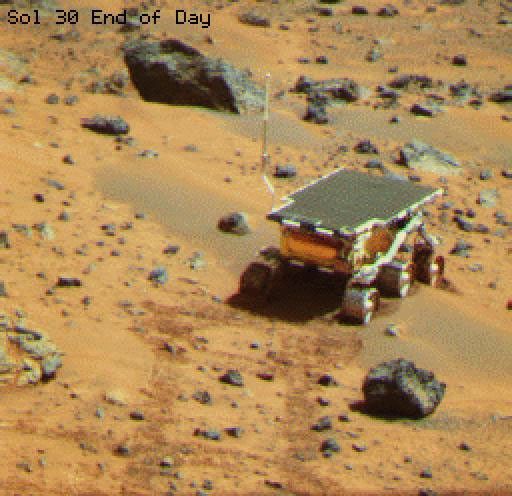This is an image of the rover Sojourner at the feature called Mermaid Dune at the MPF landing site. Mermaid is thought to be a low, transverse dune ridge, with its long (approximately 2 meters) axis transverse to the wind.
