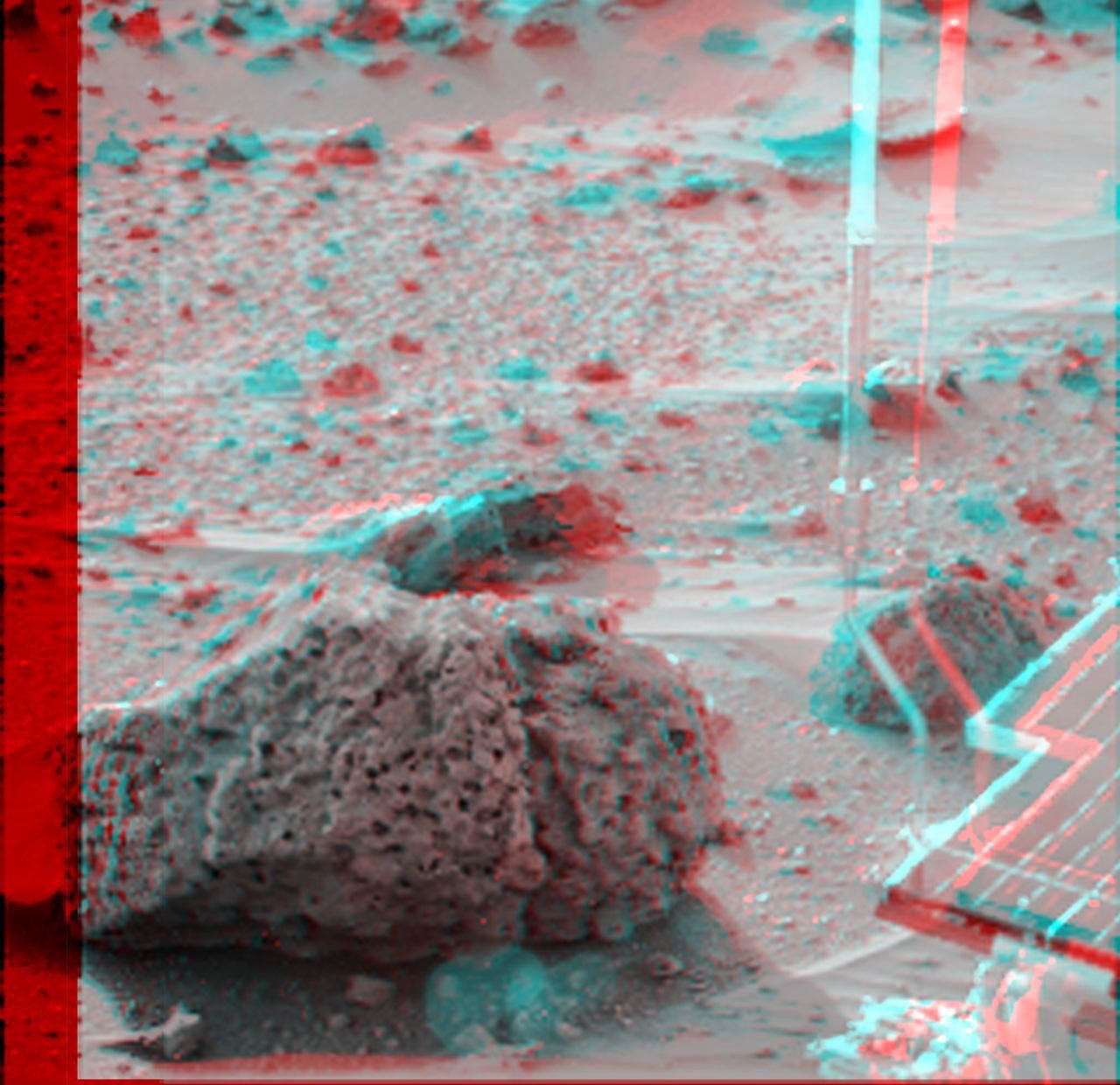 Barnacle Bill' is a small rock immediately west-northwest of NASA's Mars Pathfinder lander and was the first rock visited by the rover Sojourner. 3D glasses are necessary to identify surface detail.
