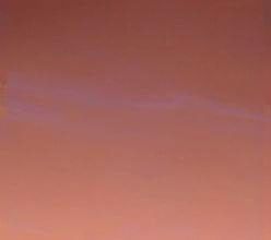 These are more wispy blue clouds from Sol 39, Aug. 12, 1997, as seen by the Imager for NASA's Mars Pathfinder. The bright clouds near the bottom are about 30 degrees above the horizon. The clouds are thought to be made of small water ice particles.