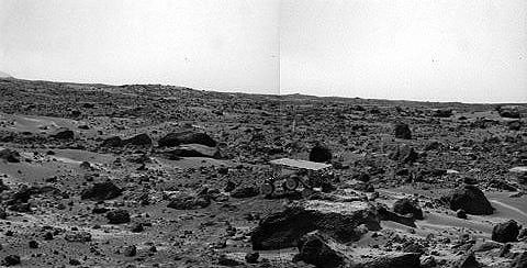 This image from NASA's Imager for Mars Pathfinder (IMP) shows noontime on Sol 75 (September 18). The rover's middle right wheel is raised above the surface. Sojourner is over 12 m from the lander, a mission record. Sol 1 began on July 4, 1997.