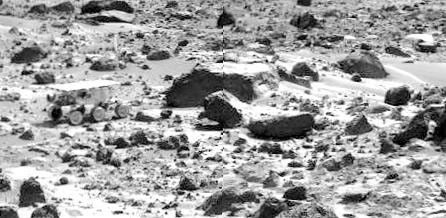 This image mosaic taken by NASA's Imager for Mars Pathfinder (IMP) shows the Sojourner rover near the large rock 'Chimp' on the afternoon of Sol 72 (September 15). Sol 1 began on July 4, 1997.