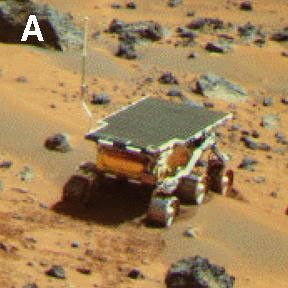 NASA's Mars Pathfinder Lander camera image of Sojourner Rover atop the 'Mermaid dune' on Sol 30. Note the dark material excavated by the rover wheels. Sol 1 began on July 4, 1997.