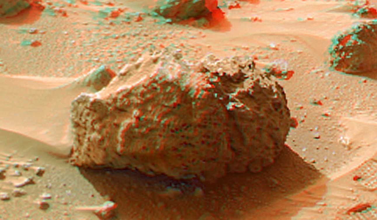 Barnacle Bill' is a small rock immediately west-northwest of NASA's Mars Pathfinder lander and was the first rock visited by the rover Sojourner. 3D glasses are necessary to identify surface detail.