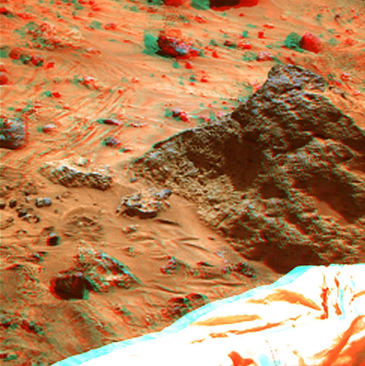 Mini Matterhorn' is a 3/4 meter rock immediately east-southeast of NASA's Mars Pathfinder lander. 3D glasses are necessary to identify surface detail.
