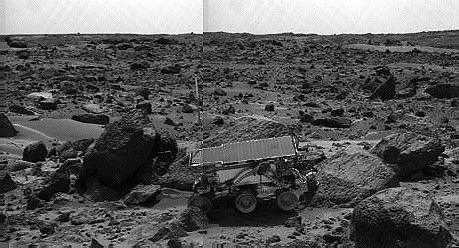 NASA's Sojourner rover's Alpha Proton X-ray Spectrometer (APXS) is shown deployed against the rock 'Moe' on the afternoon of Sol 64 (September 7, 1997).