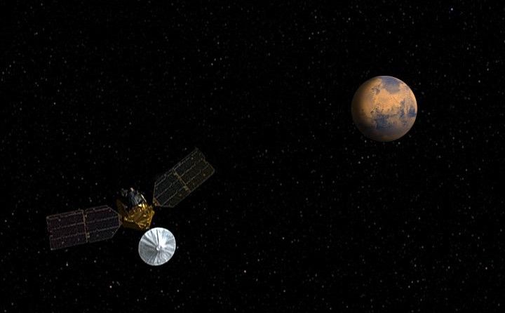 Artist's concept of Mars Reconnaissance Orbiter approaching Mars.