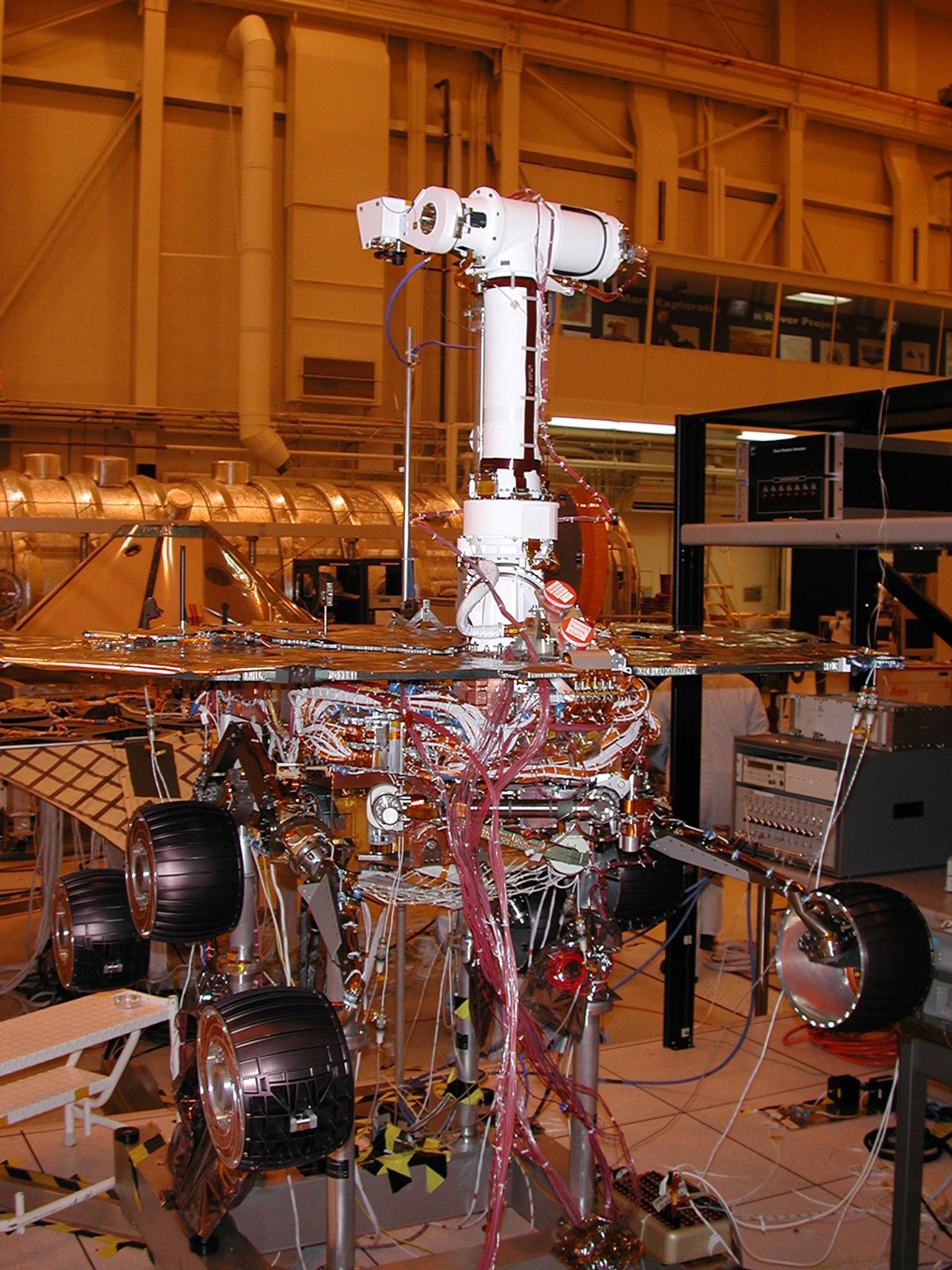 Engineers for NASA's Mars Exploration Rover Mission are completing assembly and testing for the twin robotic geologists at JPL.