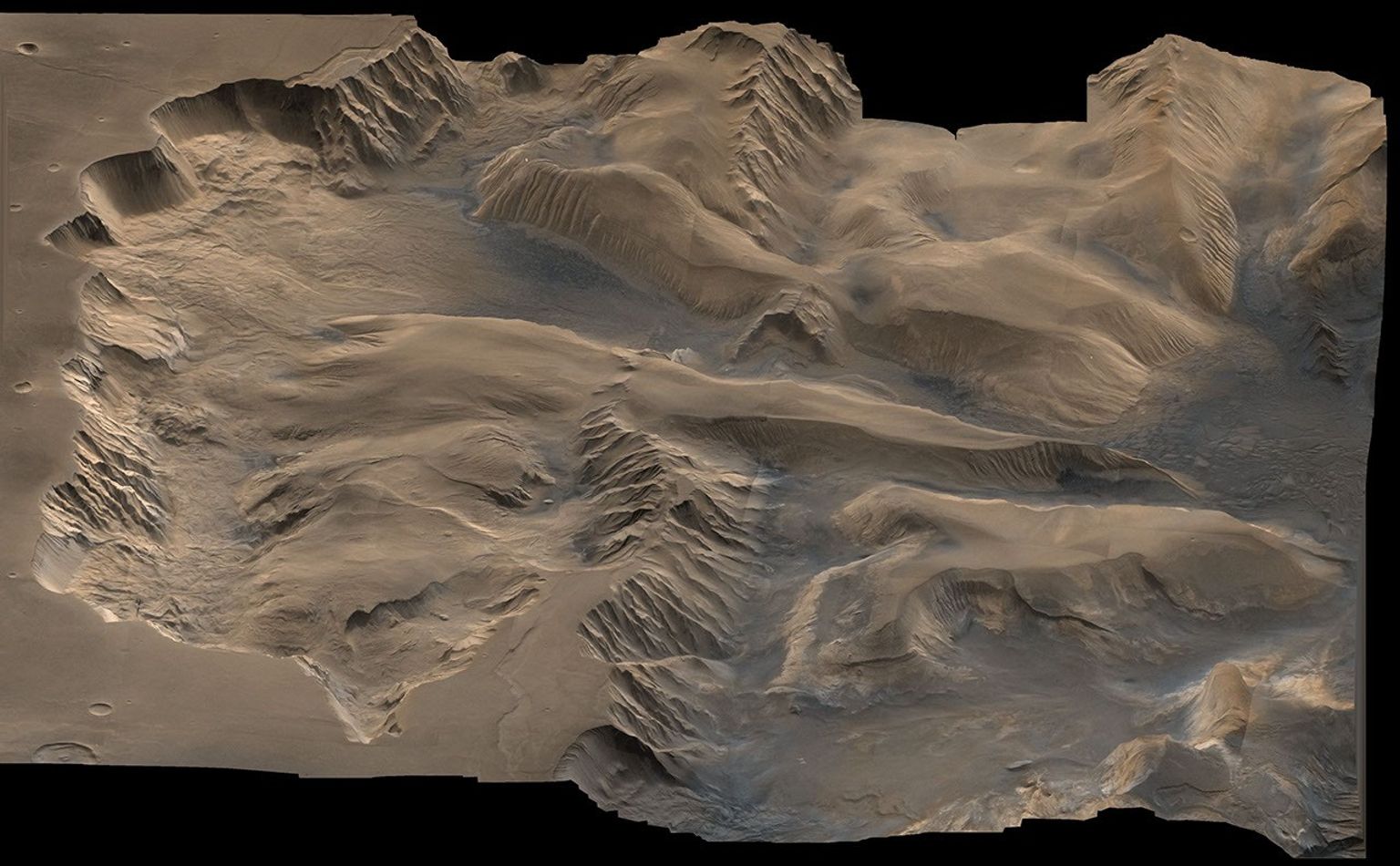 An oblique, color image of central Valles Marineris, Mars showing relief of Ophir and Candor Chasmata; view toward east. The photograph is a composite of Viking high-resolution images in black and white and low-resolution images in color.