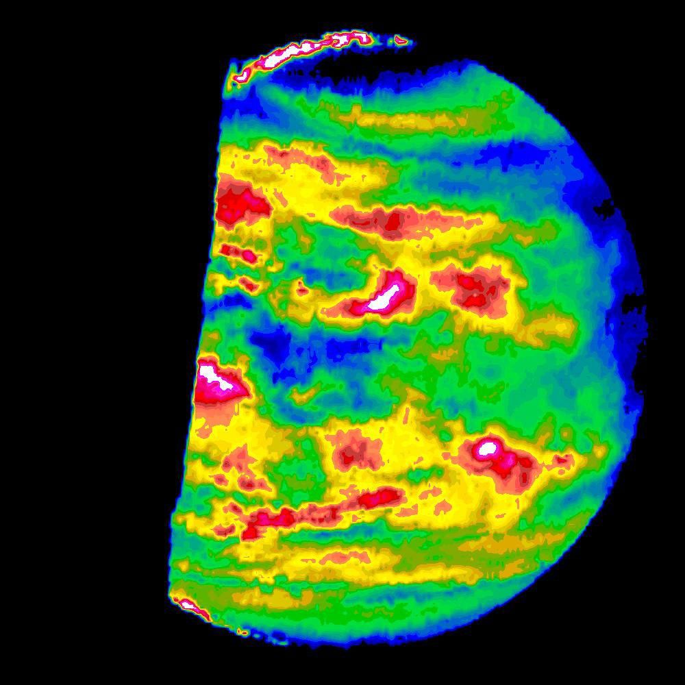 This image is a false color version of a near infrared map of lower level clouds on the night side of Venus, obtained by the Near Infrared Mapping Spectrometer aboard the Galileo spacecraft as it approached the planet Feb. 10, 1990.