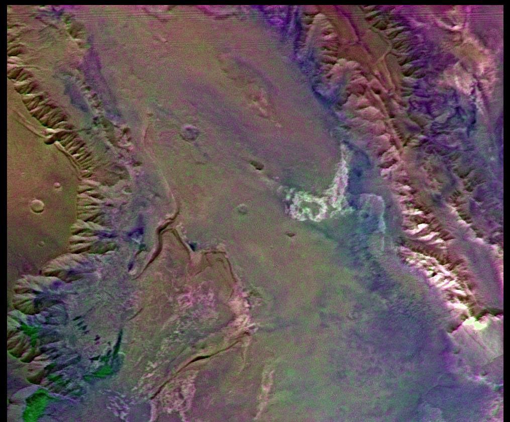 This picture (centered at latitude 10 degrees S., longitude 74 degrees W.) shows much of Mars' Melas Chasm and a portion of Candor Chasm (upper right) in central Valles Marineris as seen by NASA's Viking Orbiter 2.