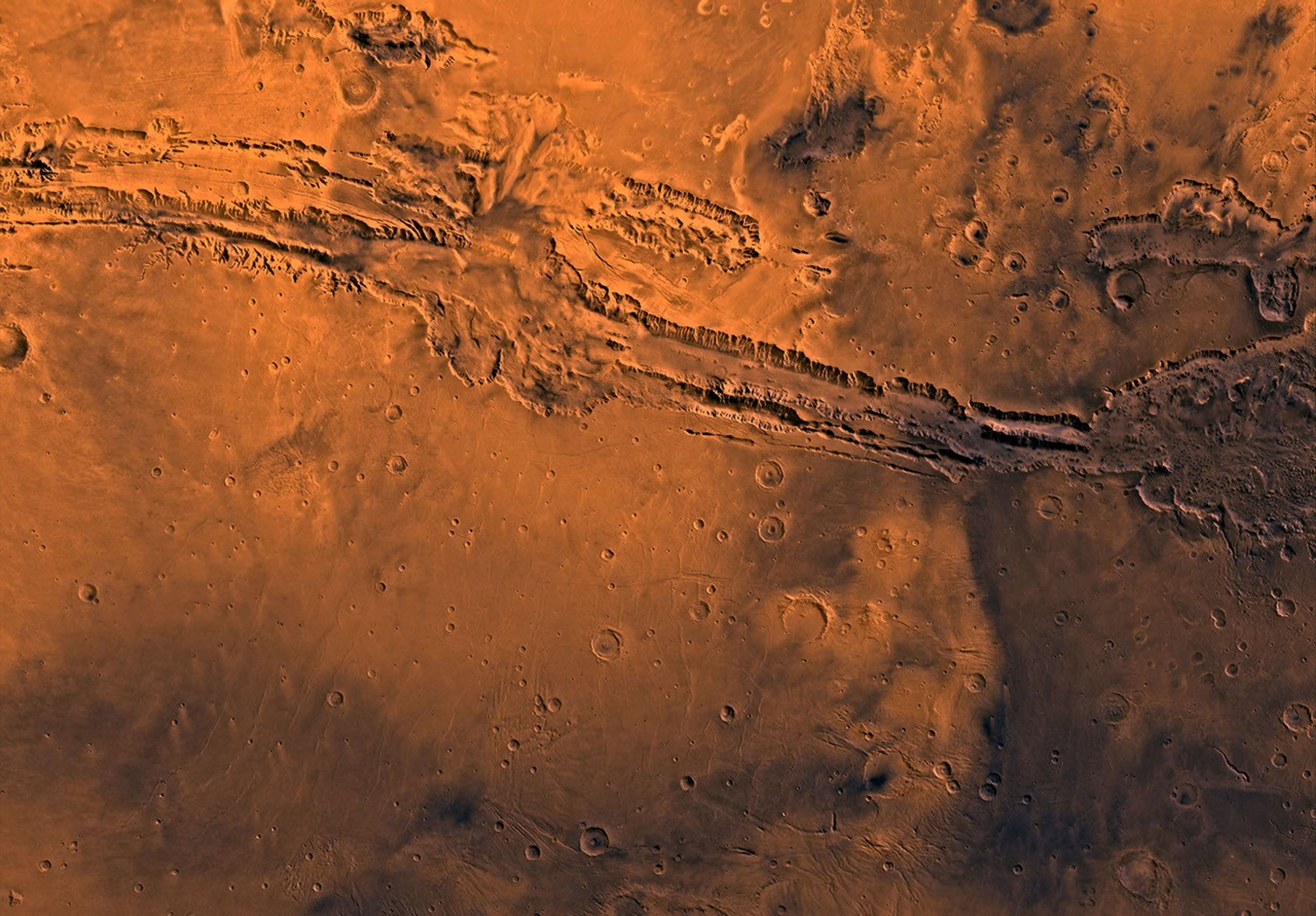 Mars digital-image mosaic merged with color of the MC-18 quadrangle, Coprates region of Mars. This image is from NASA's Viking Orbiter 1.