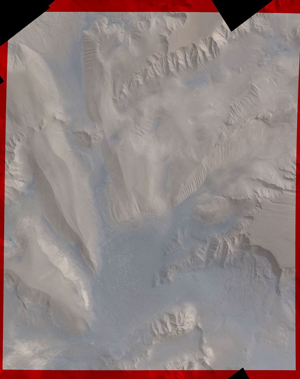 Part of Candor Chasm in Valles Marineris, Mars. Layered terrain is visible in the scene from NASA's Viking Orbiter 1., perhaps due to a huge ancient lake.