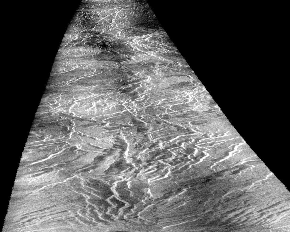 This view of the surface of Venus acquired by NASA's Magellan spacecraft shows a geographically young region of lowland plains. The location is near the equator between two highland areas known as Asteria Regio and Phoebe Regio.
